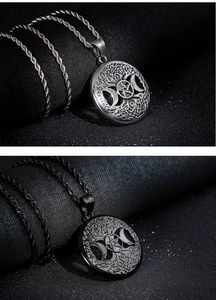 Macro shot of Viking Tree of Life pendant with Celtic knot and pentagram engravings