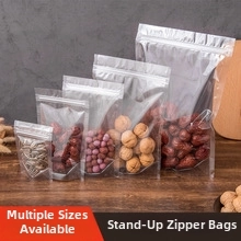 Multiple sizes of stand-up zipper pouches for food storage on a wooden surface