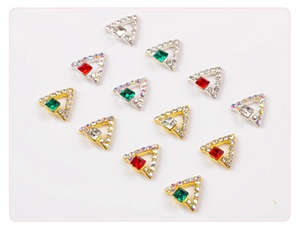 Macro view of 3D triangle nail charms with gold alloy base and colorful square rhinestones