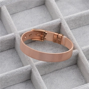 Detail of rose gold mesh band bracelet with adjustable buckle in a jewelry box