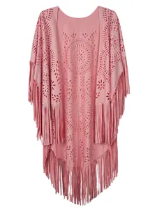 Detail of laser-cut geometric patterns and long fringes on a pink suede poncho top