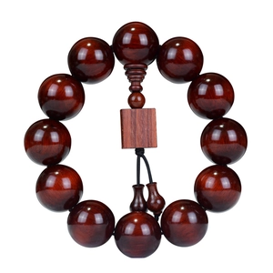 Polished dark red lobular rosewood prayer beads with 12 large spheres and a square pendant