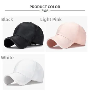 Detailed grid of camouflage mesh baseball caps in black, light pink and white colors
