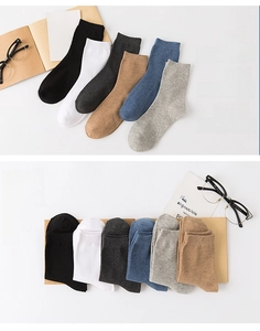 Close-up of combed cotton crew socks in six neutral colors highlighting breathable texture