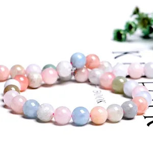Natural colorful morganite round gemstone beads for DIY jewelry making on white background