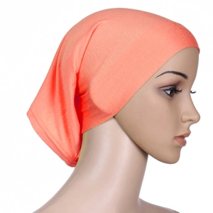 Detailed side view of an orange mercerized cotton stretch turban cap for women