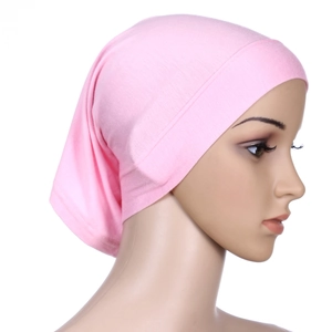 Side view of soft pink mercerized cotton inner hijab cap on female mannequin head