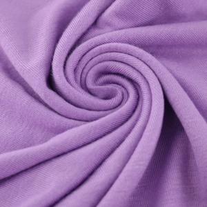 Macro shot of purple mercerized cotton fabric detail with soft knitted texture
