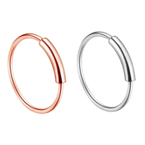 Polished stainless steel nose hoops in silver and rose gold finishes with bar detail
