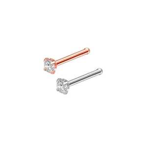 Detailed view of rose gold and silver nose studs with clear round-cut cubic zirconia