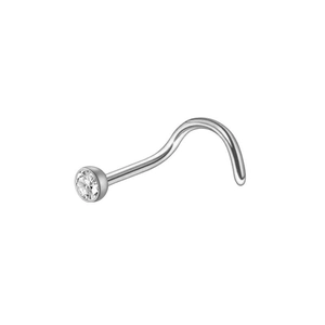 Macro shot of a stainless steel spiral nose stud with a clear round sparkling crystal
