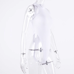 Detail of white sleeveless ribbed knit bodysuit featuring high-cut leg on a transparent form