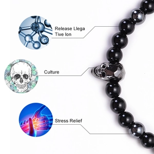 Bracciale in agata nera naturale ed ematite con teschi e icone di benessere e salute
