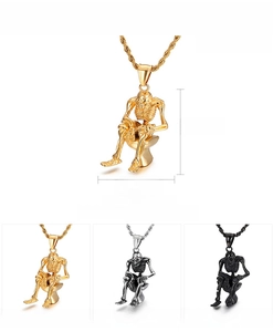 Detailed view of punk style skull on toilet pendant in gold, steel and black finishes