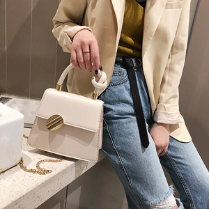 Chic cream white PU leather handbag with gold round buckle and knotted handle detail