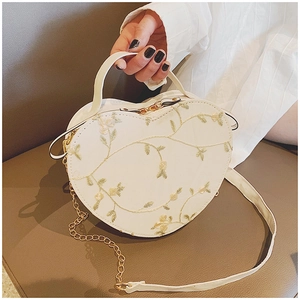 Chic heart-shaped cream PU leather crossbody bag with floral embroidery and gold chain