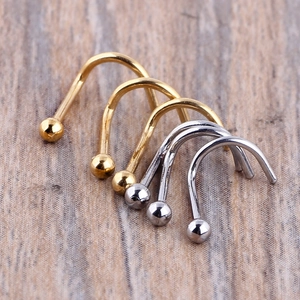 Five-piece curved nose stud set in gold and silver finish with polished ball ends