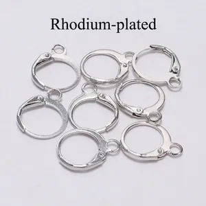 Detailed view of eight rhodium-colored leverback earring hooks for DIY jewelry making