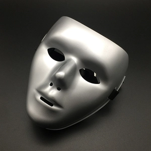 Close-up of a matte silver full face mask with elastic strap on black background