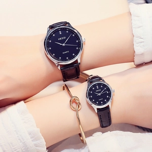 Elegant pair of black leather strap quartz watches with rhinestones and gold knot bracelet