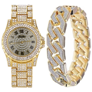 Close-up of luxury gold iced-out men's watch and Cuban link bracelet set with crystals