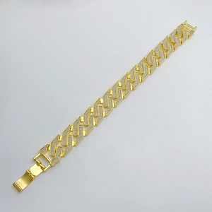 Close-up of golden Cuban link bracelet with S-shape frosted links and folding clasp