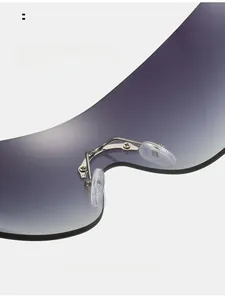 Close-up of comfortable nose pads and gradient purple lenses on rimless sports sunglasses