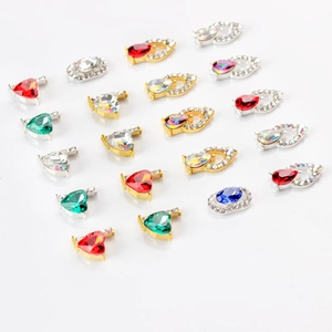 Mix of colorful crystal nail art jewels with alloy bases and sparkling rhinestone edges