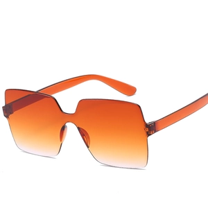 Oversized rimless orange gradient sunglasses with wide temples for a trendy look