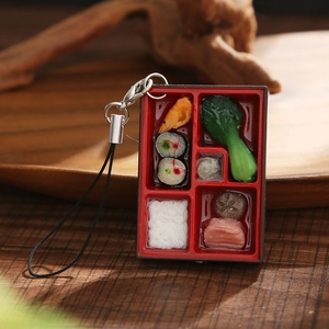 Porte-clés bento japonais réaliste en PVC avec sushi et riz sur table en bois