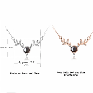 Detailed size view of silver and rose gold deer antler necklaces with projection stone