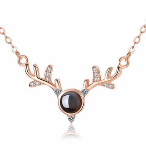 Rose gold reindeer necklace with hidden I Love You projection stone and cubic zirconia