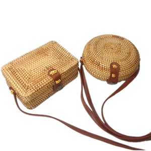 Handmade woven rattan crossbody bags in rectangular and round shapes with leather straps