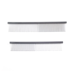 Detail of two stainless steel pet grooming combs with fine metal teeth for dogs and cats