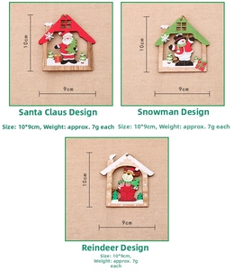 Detail of laser-cut wooden Christmas tree ornaments featuring Santa, Snowman and Elk designs
