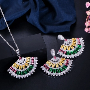 Detailed macro view of colorful zircon fan-shaped pendant necklace and earring jewelry set