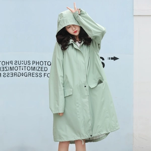 Waterproof long hooded raincoat in light green with stylish windbreaker design and pockets