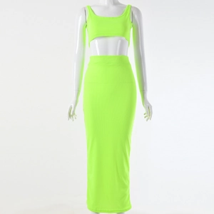 Detail view of neon green ribbed two-piece set featuring cropped top and long maxi skirt