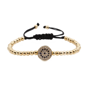 Adjustable evil eye woven bracelet with gold beads and micro-pave crystals