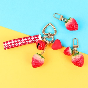 Cute strawberry keychain with red heart bell and houndstooth ribbon charm for bags