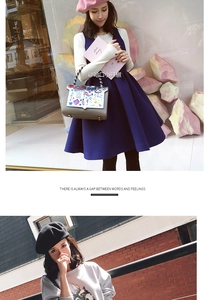 Chic styling detail of a wool beret hat paired with a sleeveless dress and designer bag