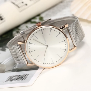 Minimalist rose gold and silver mesh strap quartz watch for women with a white sunray dial