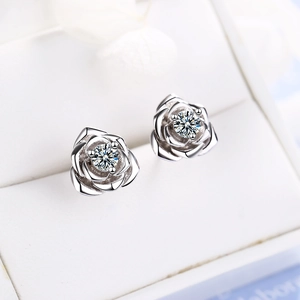 Silver rose flower stud earrings with round crystal stone in white jewelry box