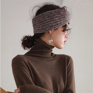 Close-up of knit ear warmer headband in taupe chenille fabric with ribbed texture