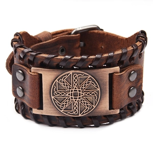 Brown leather Celtic knot bracelet with metallic rivets and woven edges on white background