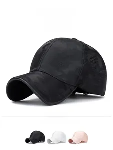Detailed view of camo baseball caps with breathable side mesh in black, white, and pink