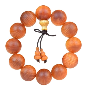 Translucent red wood prayer beads bracelet with 12 natural grain beads and gourd charms