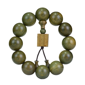 Argentinisches grünes Sandelholz-Armband mit natürlicher Maserung und Quasten