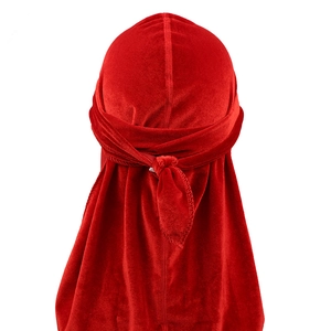 Rear view of red velvet durag showing long tail and seamless premium fabric texture