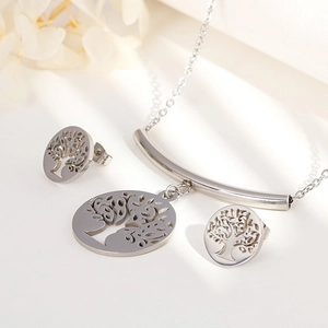 Minimalist silver tree of life jewelry set with necklace and stud earrings on white background